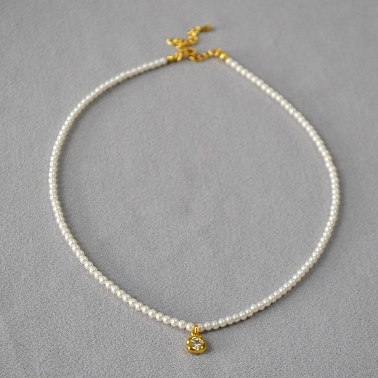 Simple pearl necklace-flower charm